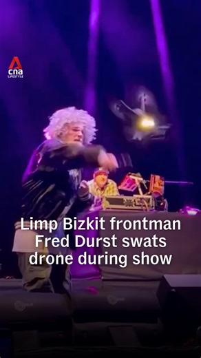 Give me somethin' to break: This is the moment when nu-metal band Limp Bizkit's frontman Fred Durst swatted a drone during a show in Istanbul, Türkiye on Sunday (Aug 17). #news #limpbizkit | CNA