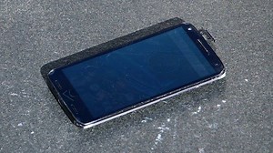 This phone is supposedly shatterproof — so we dropped it on concrete 100 times. | Insider Tech