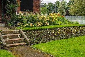 61  Sloped Backyard Ideas on a Budget [You'll Love the Photos!]