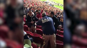 Two female fans brawl in the stands during NFL game