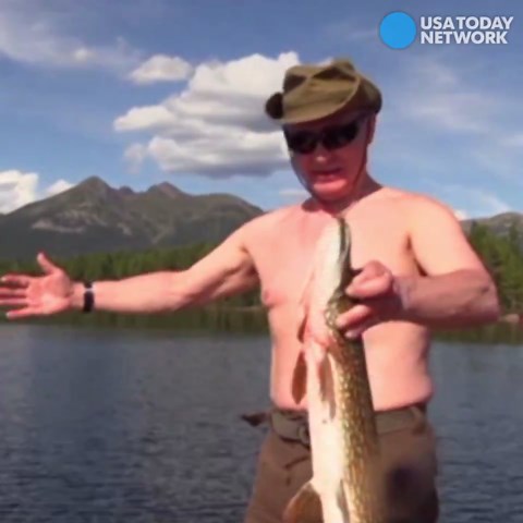 Russian President Putin seen spear fishing in Siberia