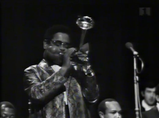 Dizzy Gillespie - Birks' Works (Live) (1952) Dizzy Gillespie, a pioneer of bebop, revolutionized jazz with his innovative compositions like "Birks' Works." Recorded in 1952 when Gillespie was at the height of his influence, this track blends Afro-Cuban jazz with bebop, reflecting his period of rich musical experimentation. Named after his nickname "Birks," the song is fundamentally a blues piece with a catchy melody and unique harmonic progression. Gillespie introduces it with a simple yet evoca
